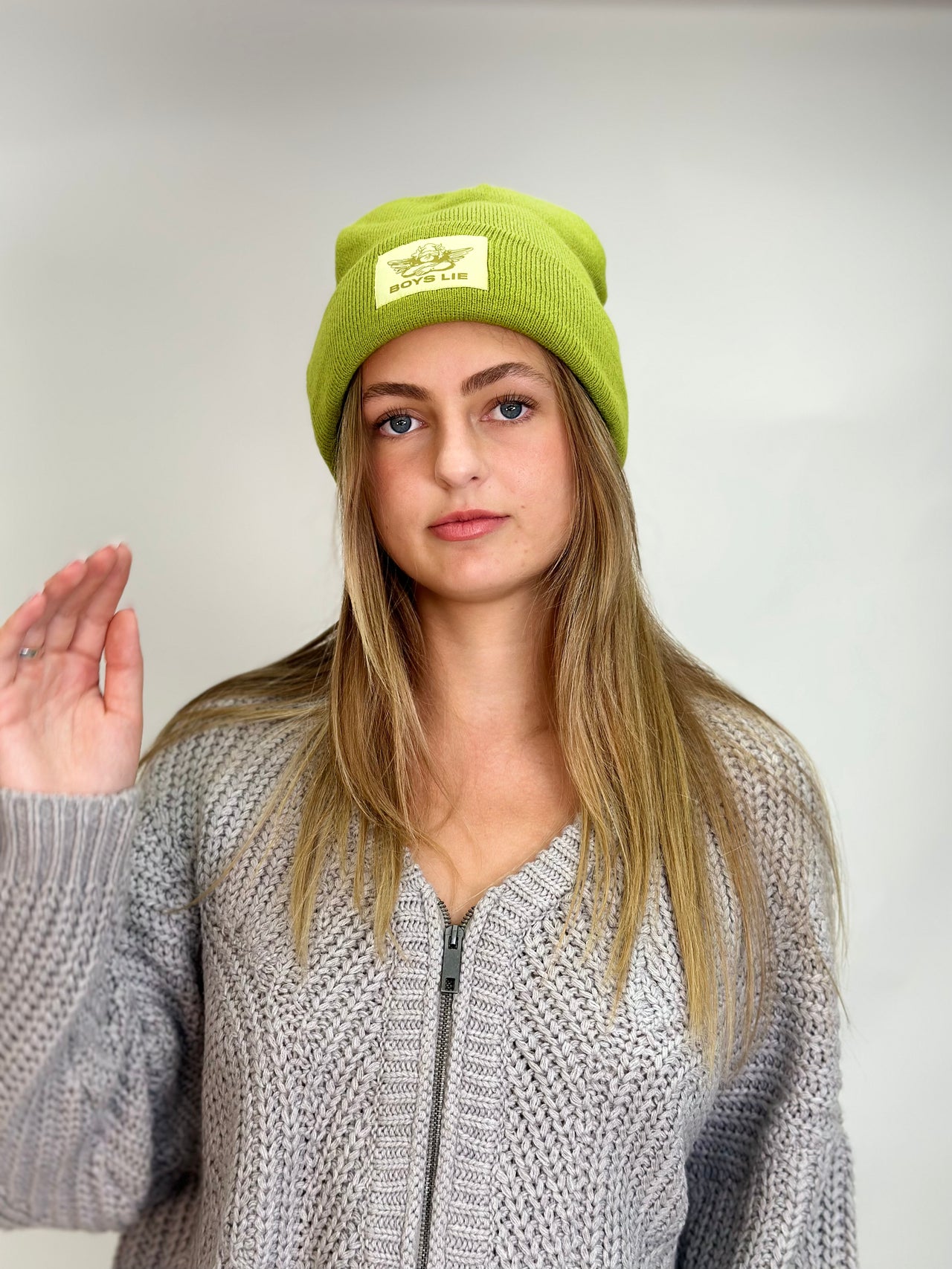 Boys green bobble hat shop